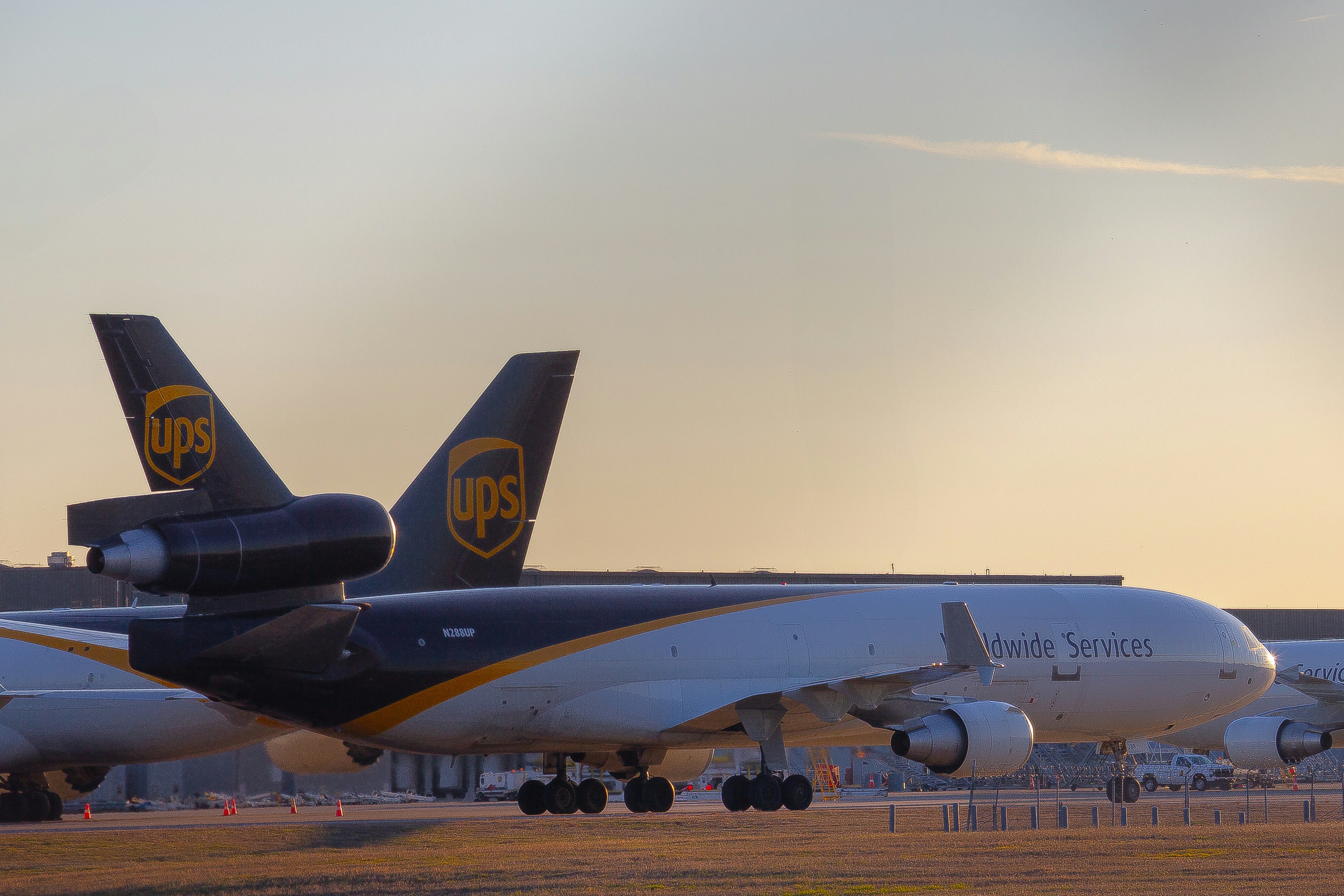 A large jetliner sitting on top of an airport runway