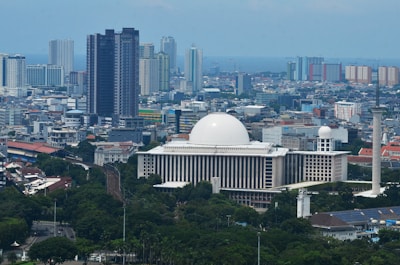 Jakarta city skyline featuring the iconic Istiqlal Mosque, Indonesia’s largest mosque