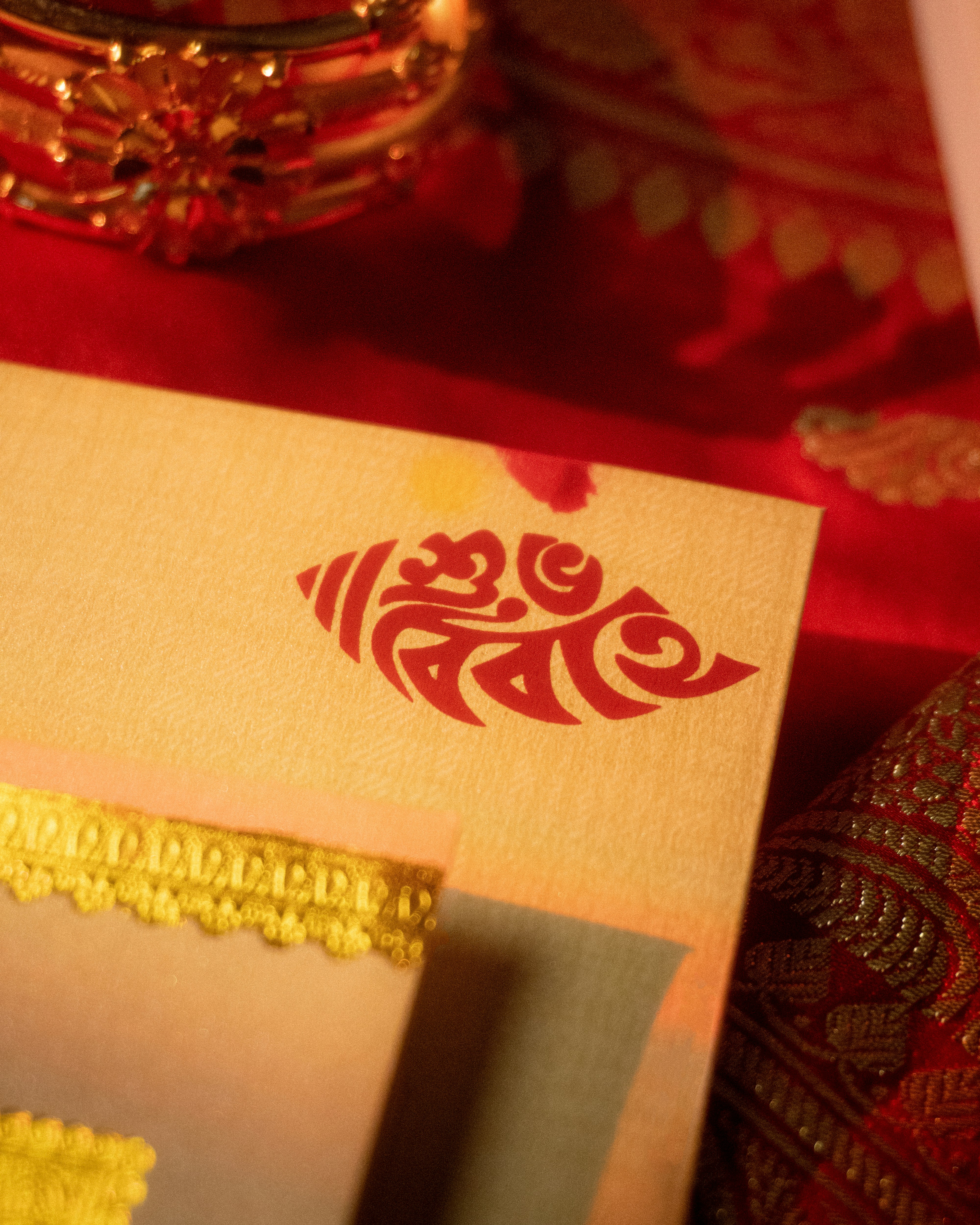 A close up of a wedding card on a table