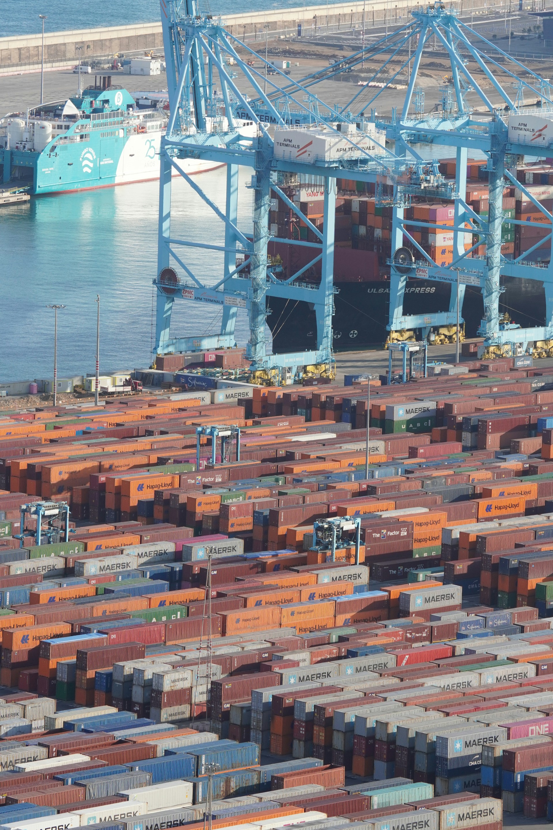 A large cargo ship docked in a harbor