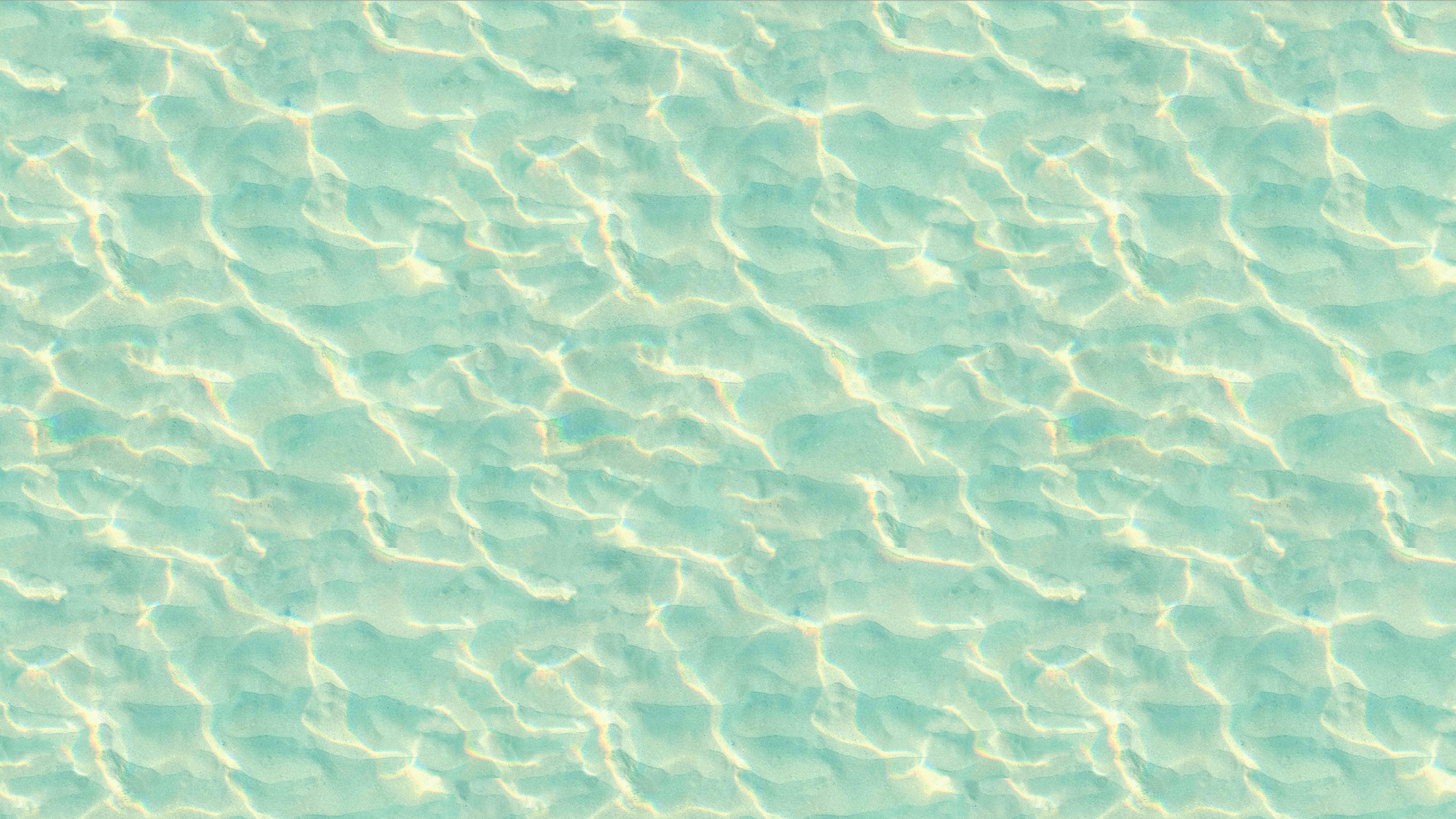 A close up of a water surface with small waves
