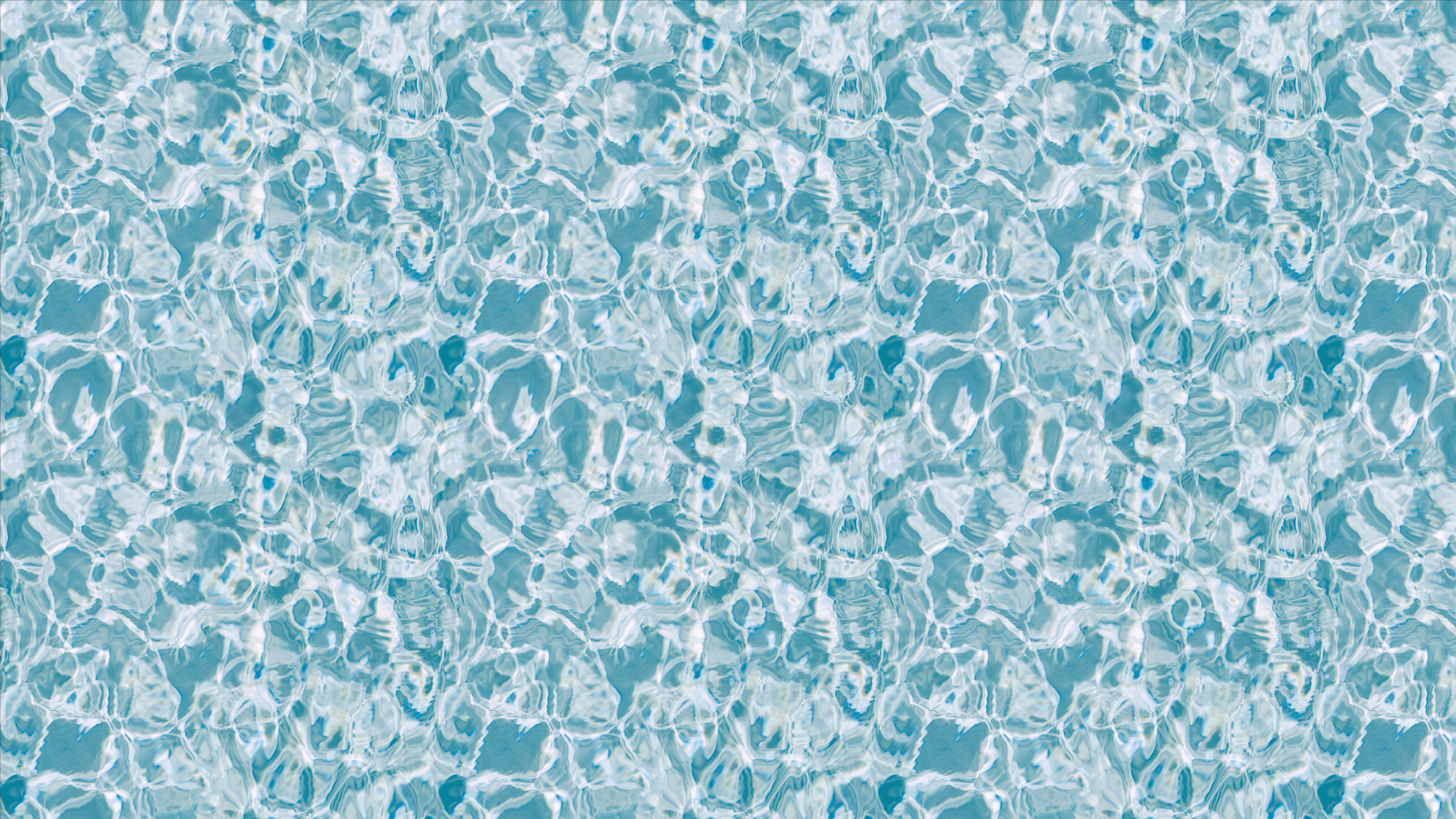A pool with a blue and white pattern on it