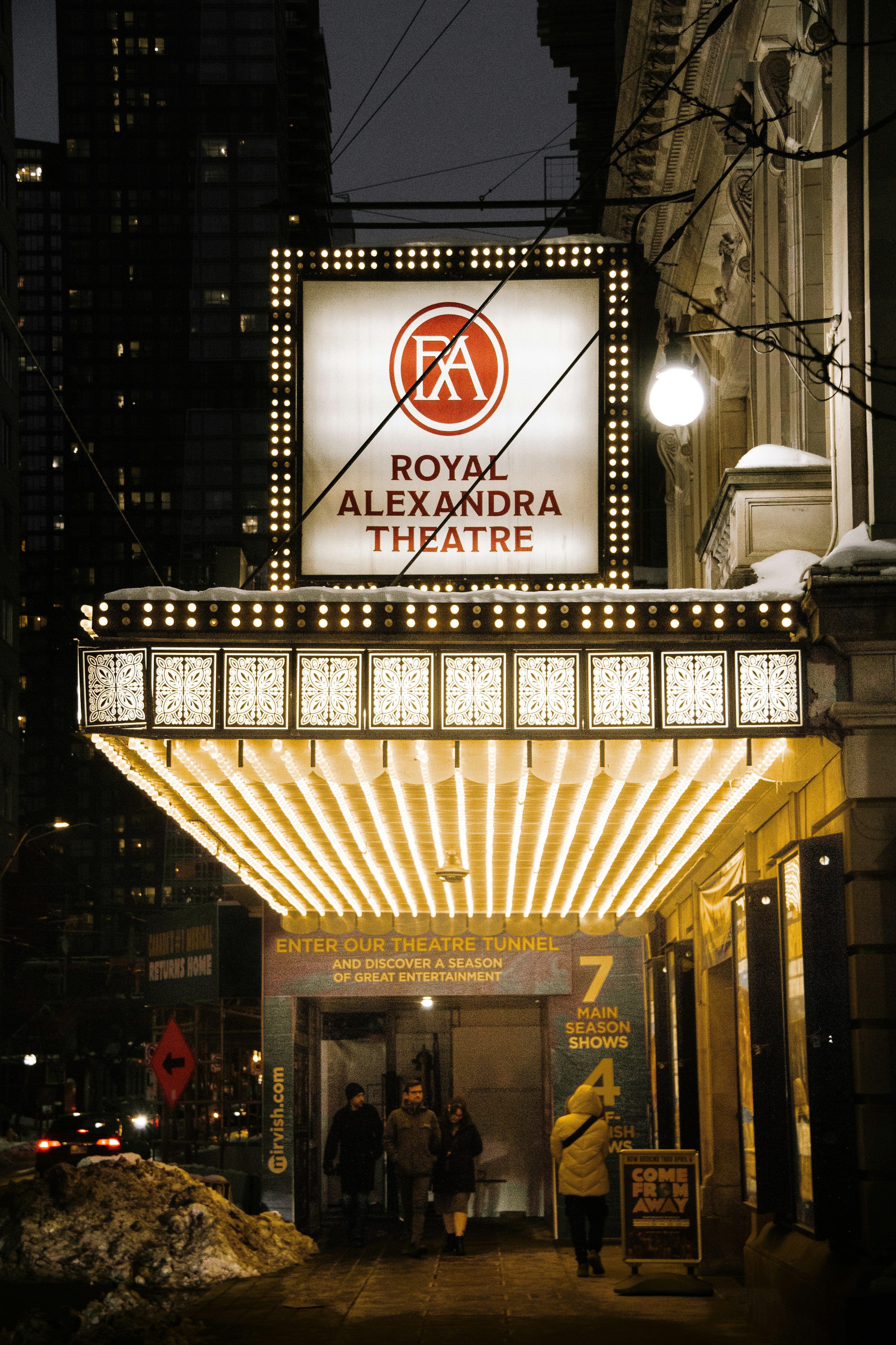 A theater marquee lit up at night