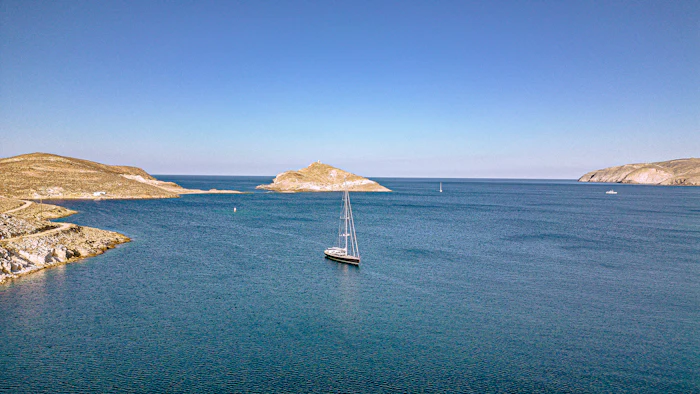 A yacht under way on open water.
