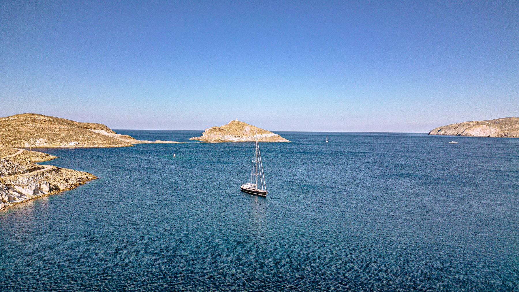 A yacht under way on open water.