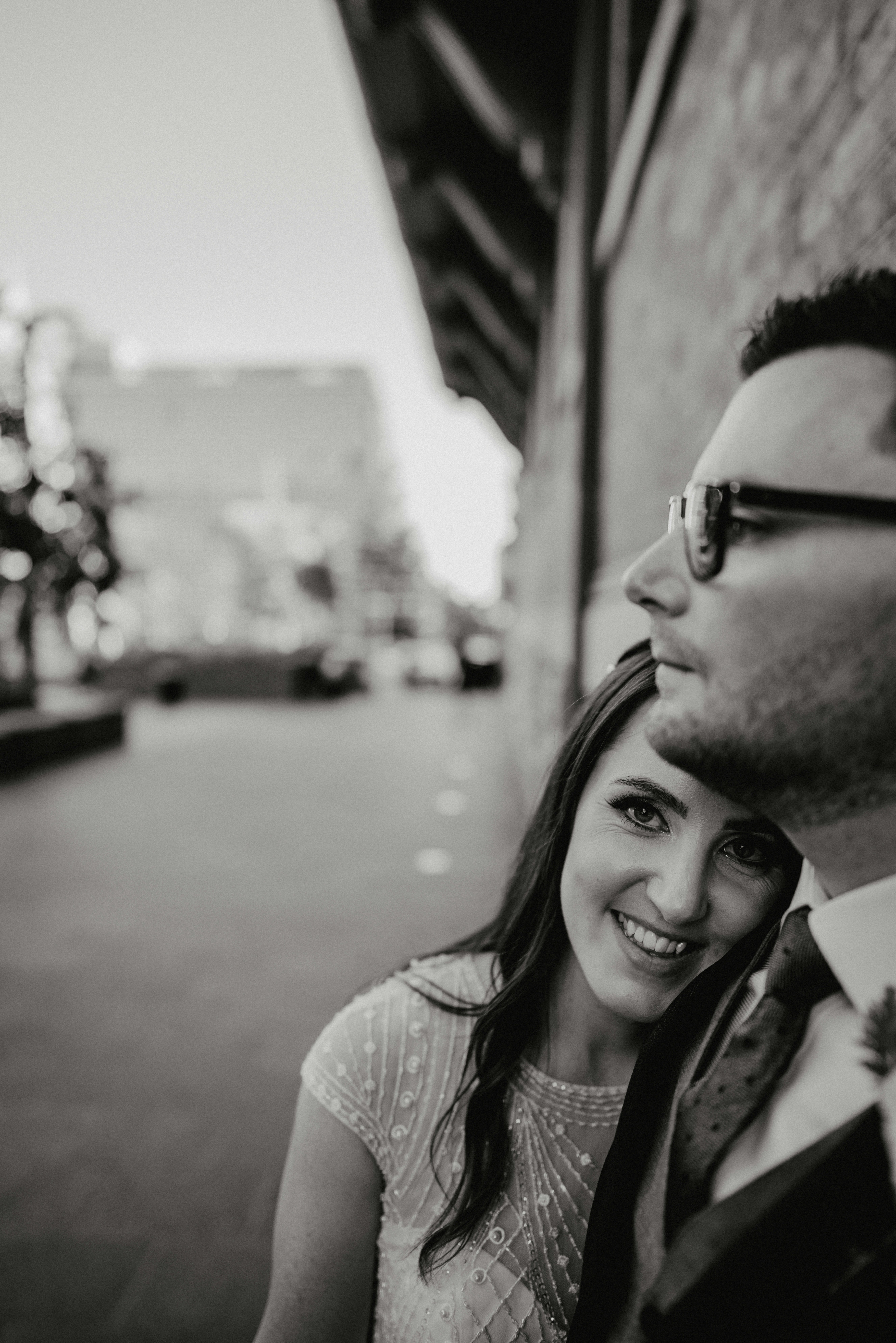 A man and a woman standing next to each other photo – Free Woman Image ...