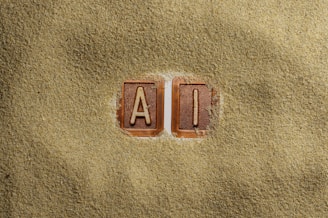 A close up of a word written in sand