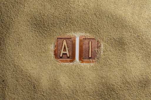 A close up of a word written in sand