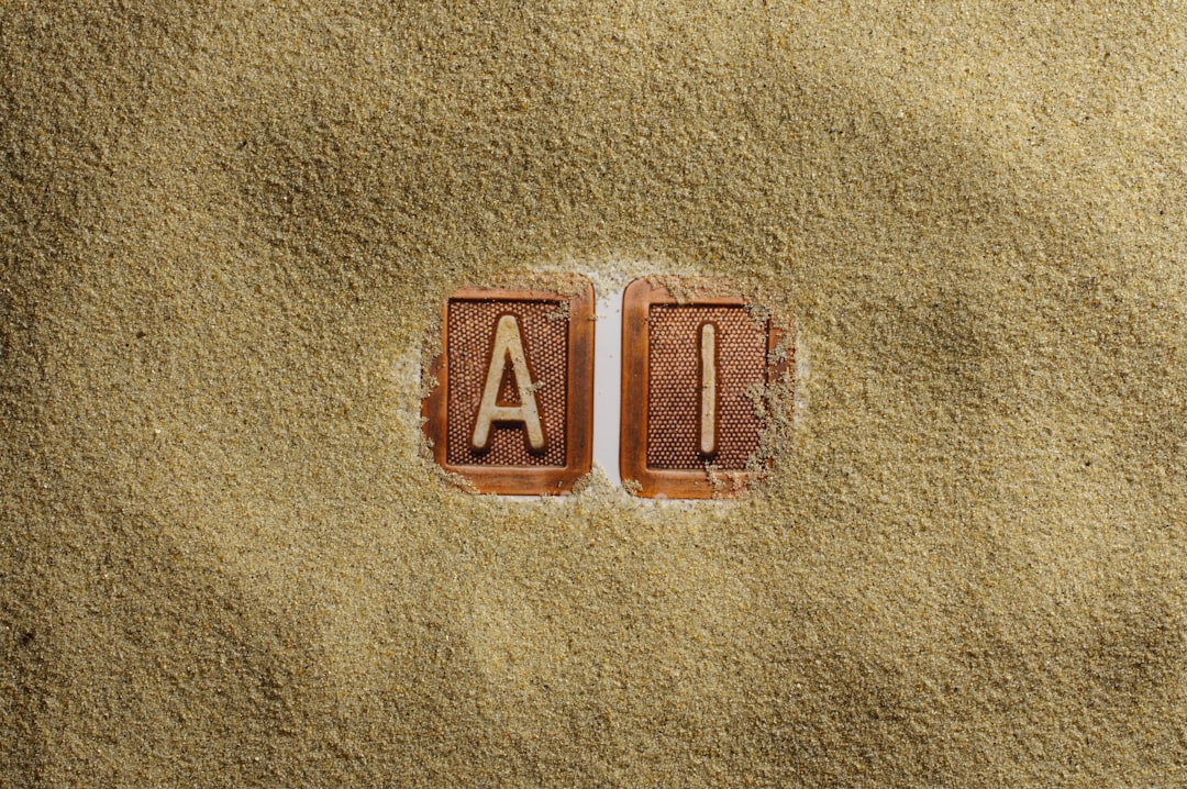 A close up of a word written in sand,