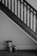 A black and white photo of a stair case