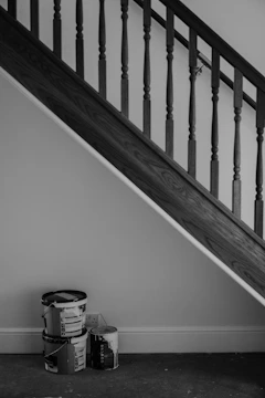 A black and white photo of a stair case