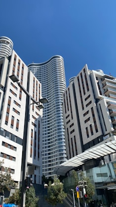 A group of tall buildings sitting next to each other