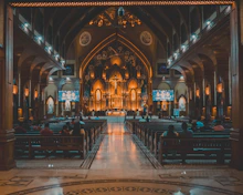 A large church with a lot of pews