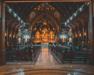 A large church with a lot of pews