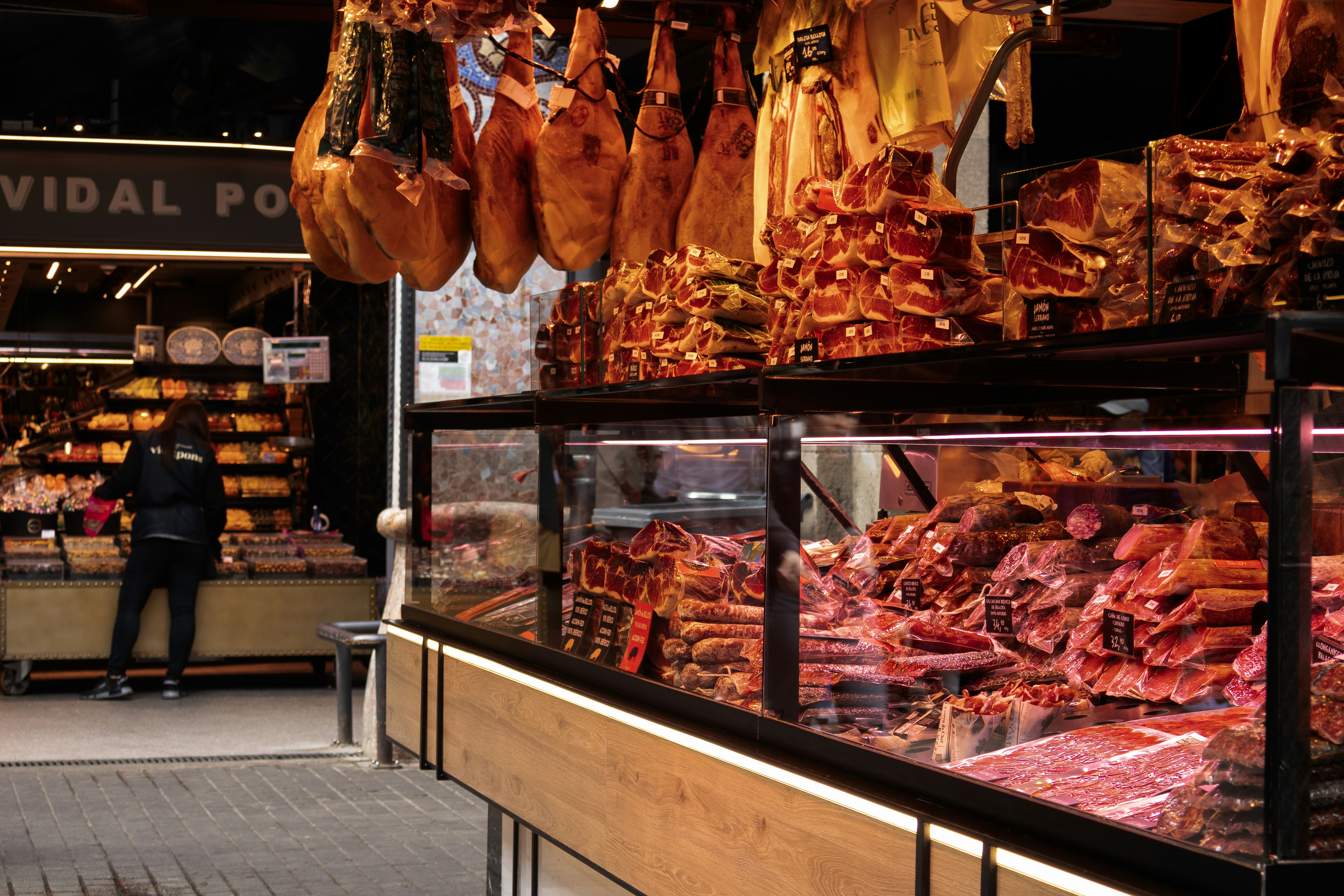 A display of meat hanging in a store
