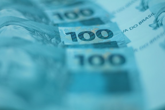 A bunch of money sitting on top of a table