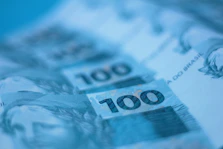 A close up of a hundred dollar bill