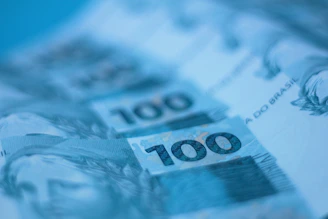 A close up of a hundred dollar bill