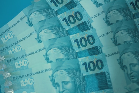 A bunch of money sitting on top of each other