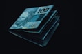 A stack of money sitting on top of each other