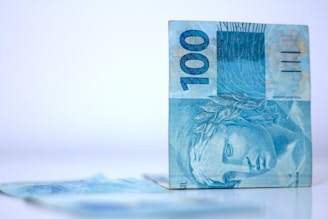 A piece of paper money sitting on top of a table