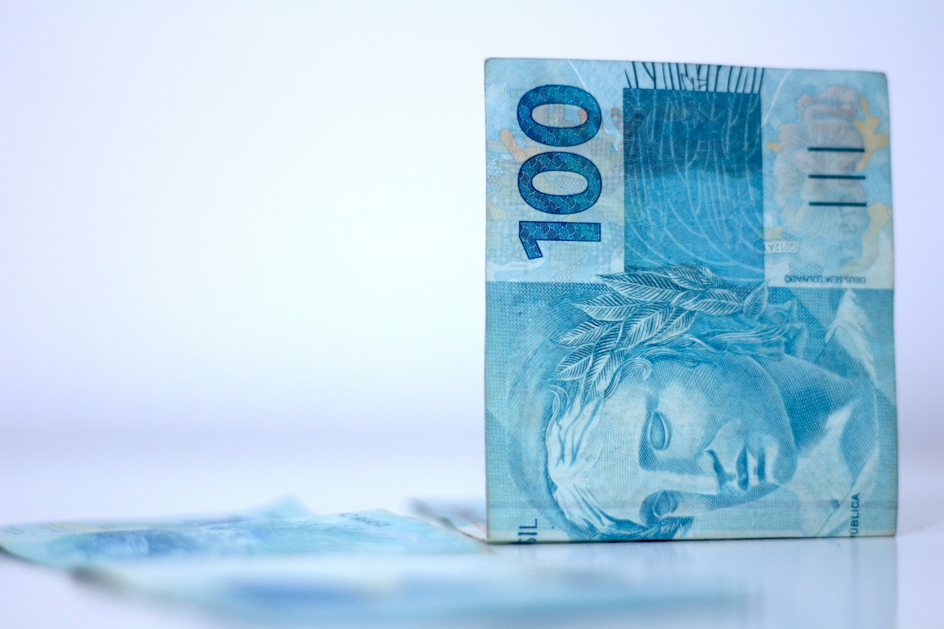 A piece of paper money sitting on top of a table