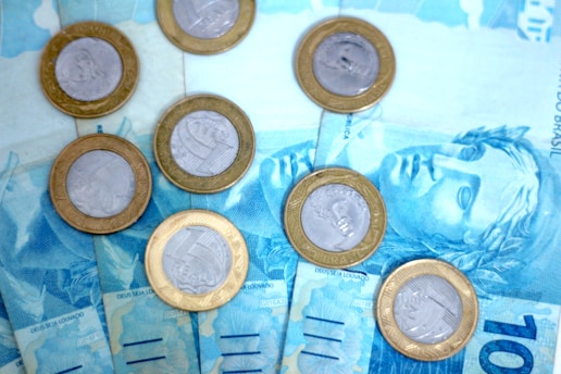A bunch of money sitting on top of each other