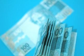 A bunch of money sitting on top of a table