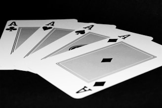 Four of a kind of playing cards on a table