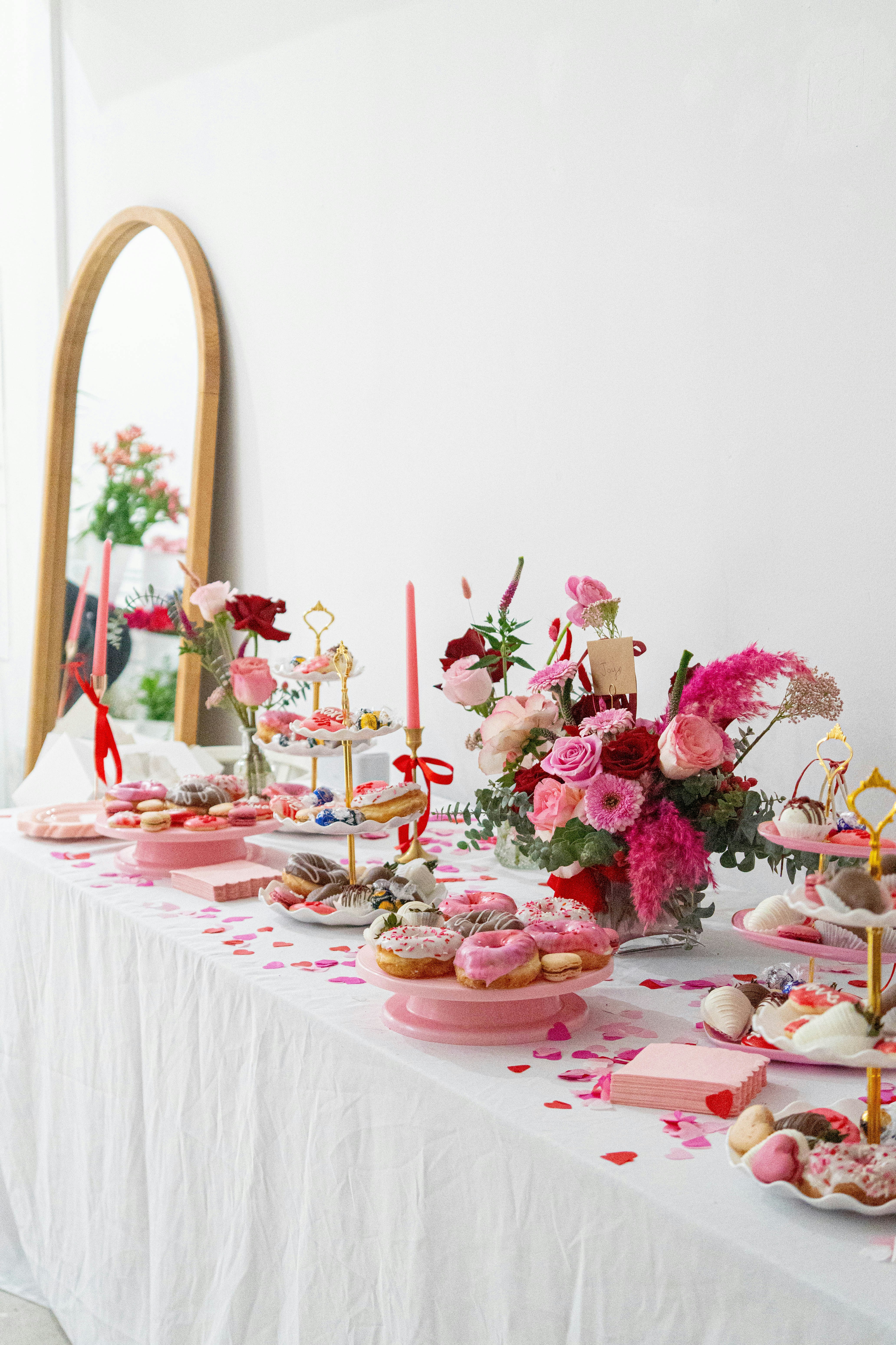 A decorated table with princess-themed birthday items