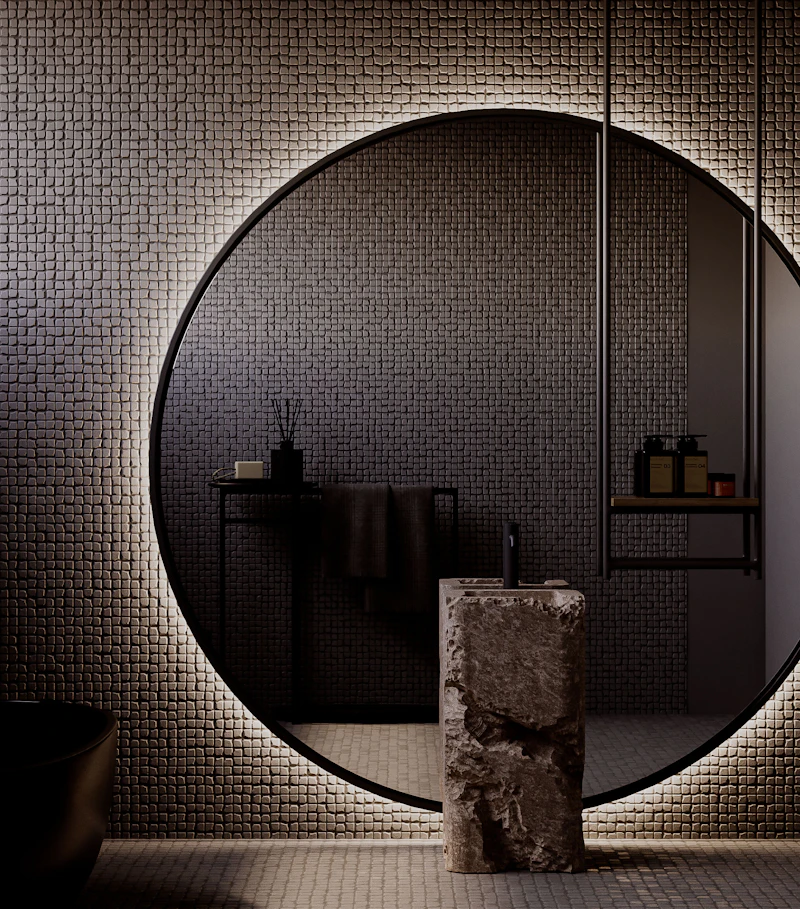 Espejo circular decorativo en un baño moderno