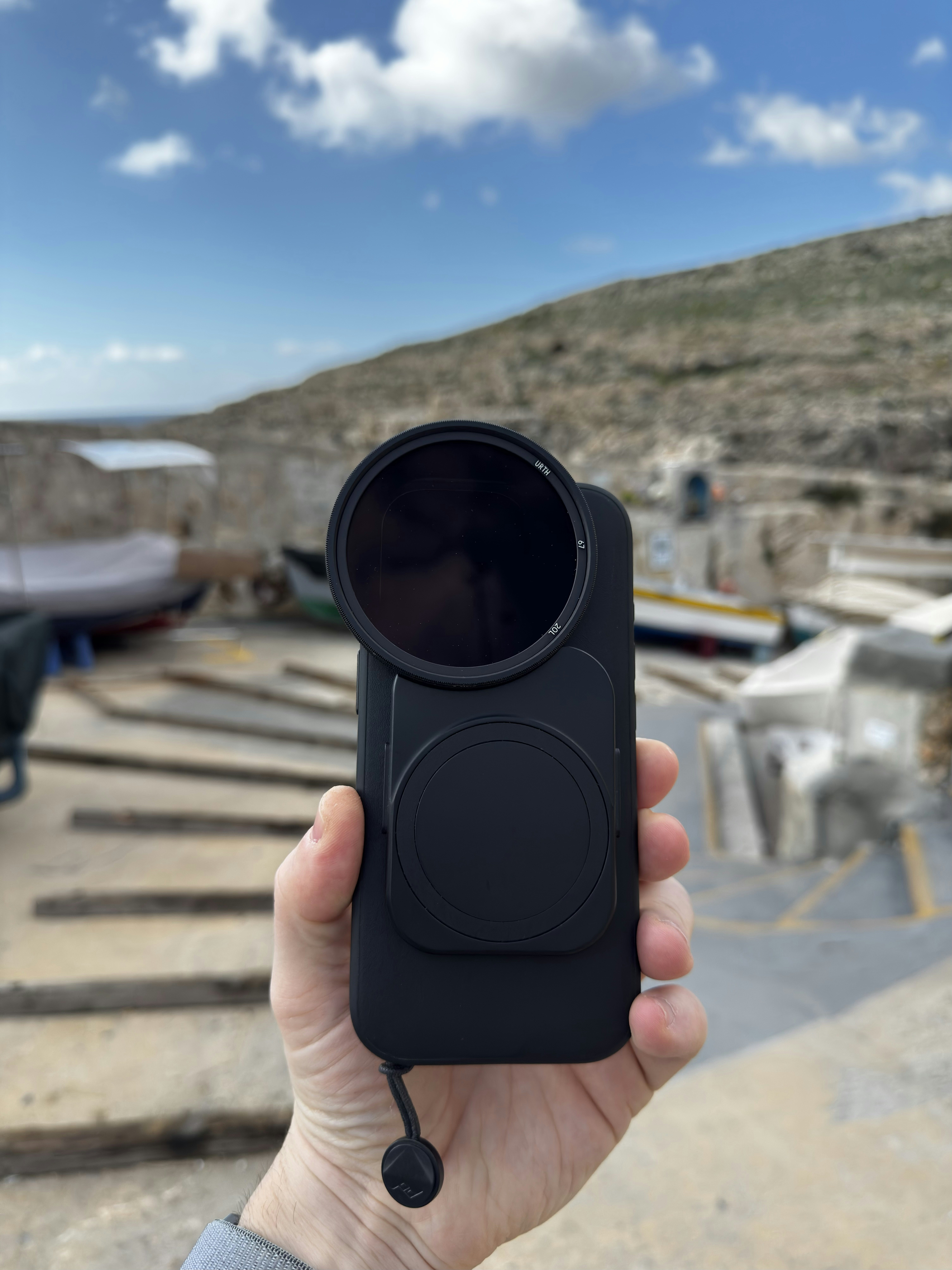 A person holding a camera in their hand