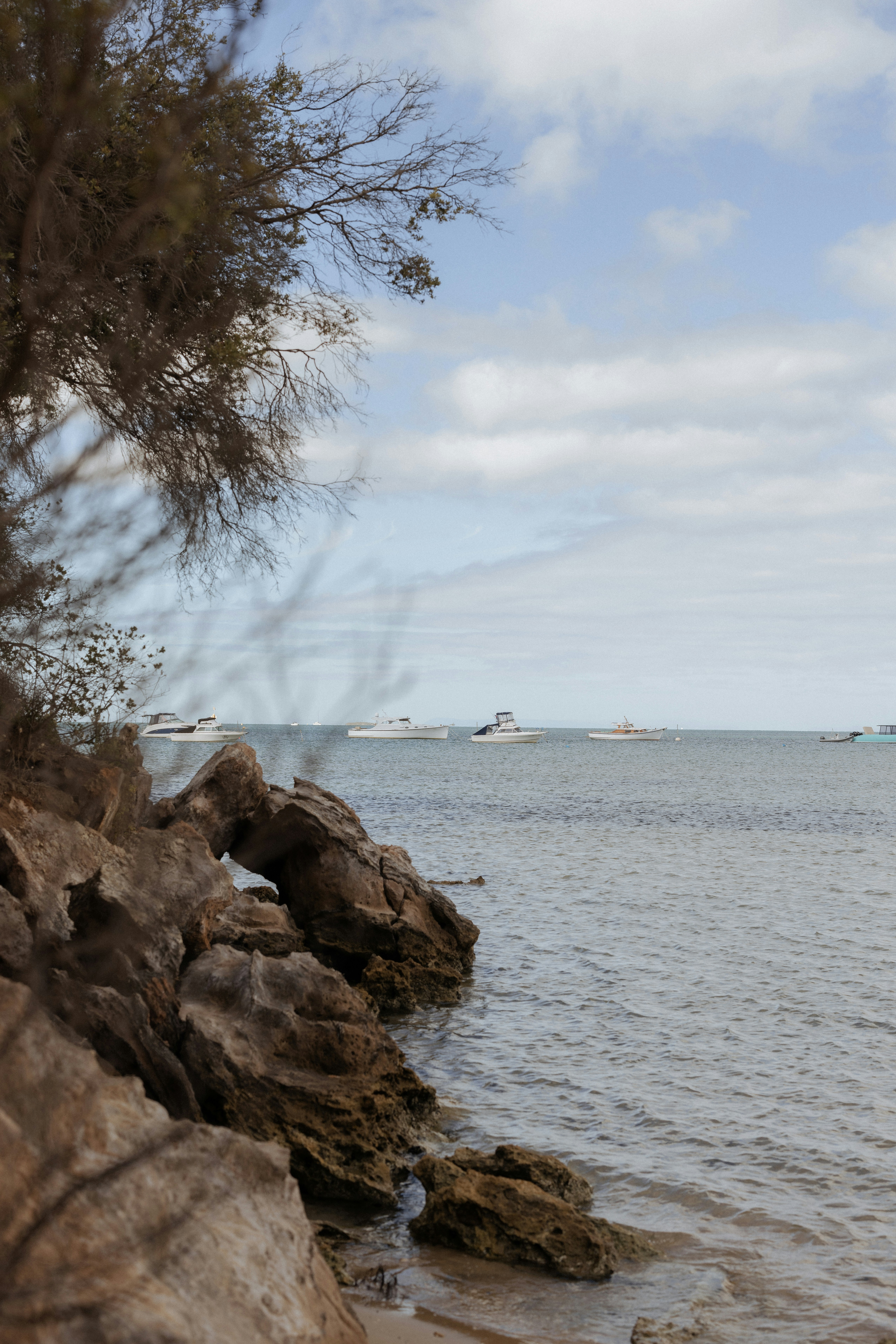 A view of a body of water with a boat in the distance