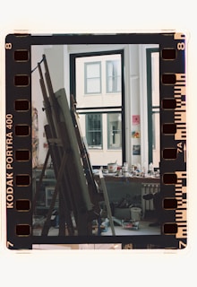 A film strip with a picture of a building in the background