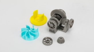 A plastic object with a yellow plastic object next to it