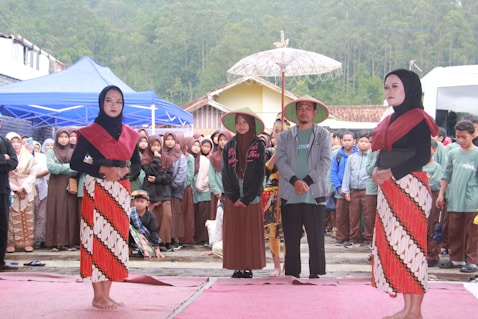 A group of people standing on top of a stage