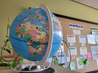 A globe sitting on top of a desk