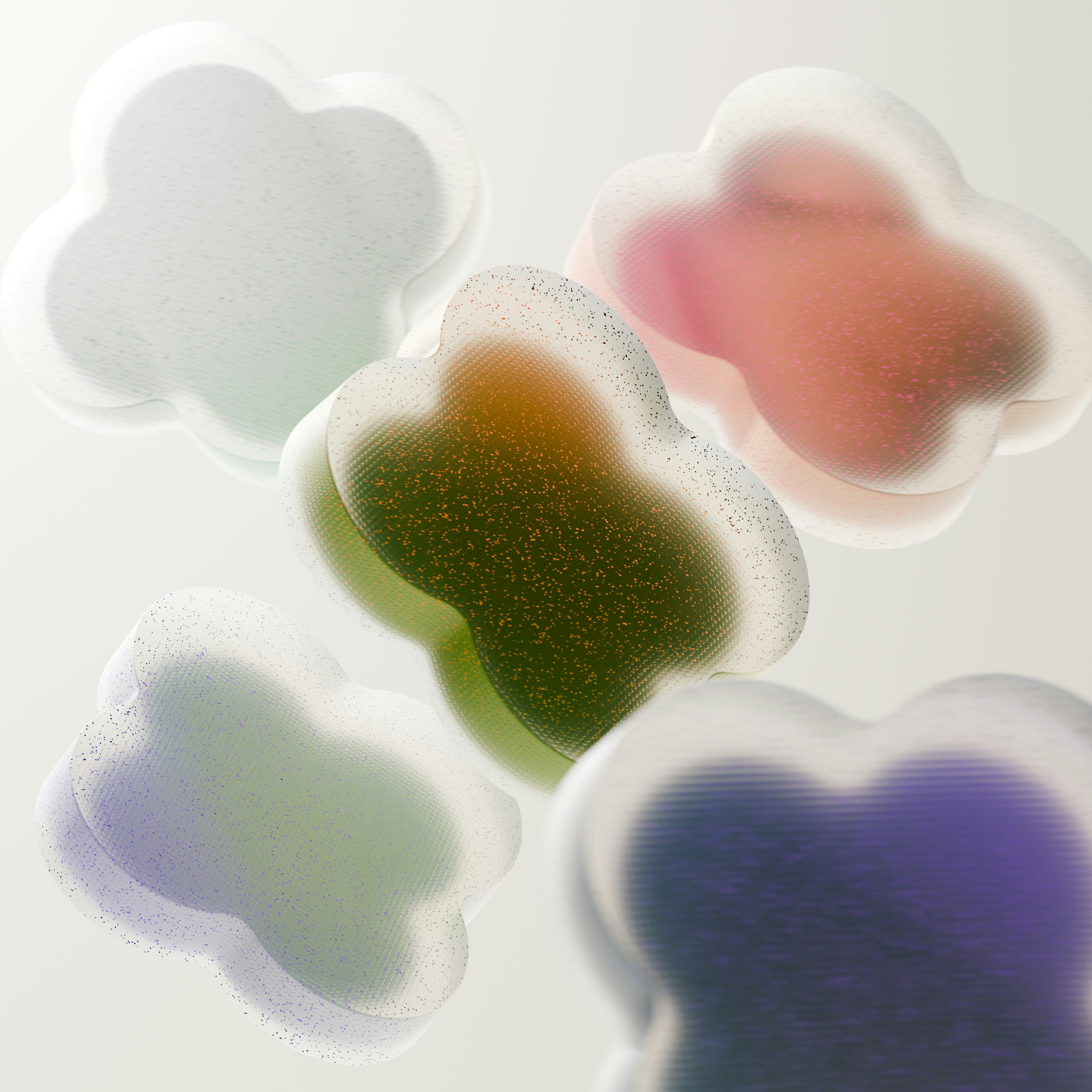 A close up of a group of different colored hearts