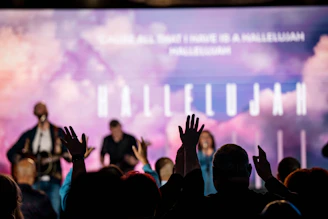 A group of people standing on top of a stage
