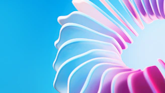 A close up of a pink and blue flower