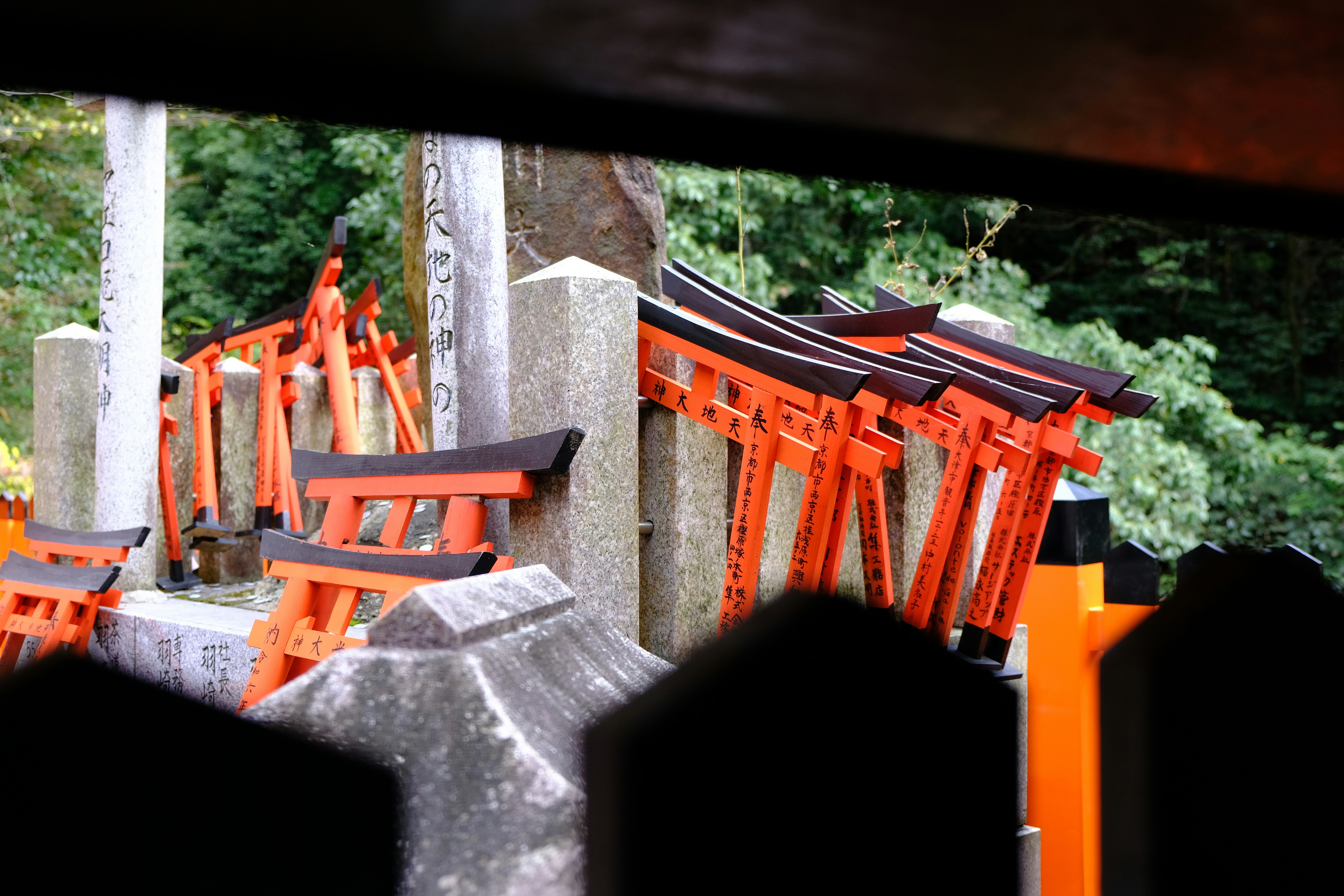 A group of orange chairs sitting next to each other