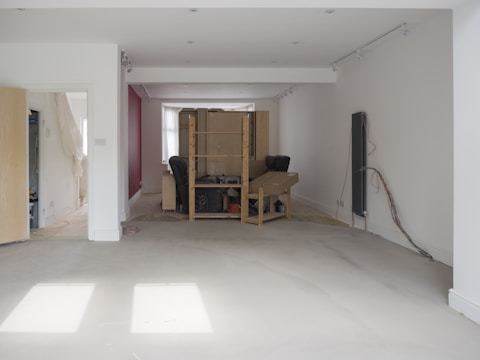 A room with a lot of furniture in it