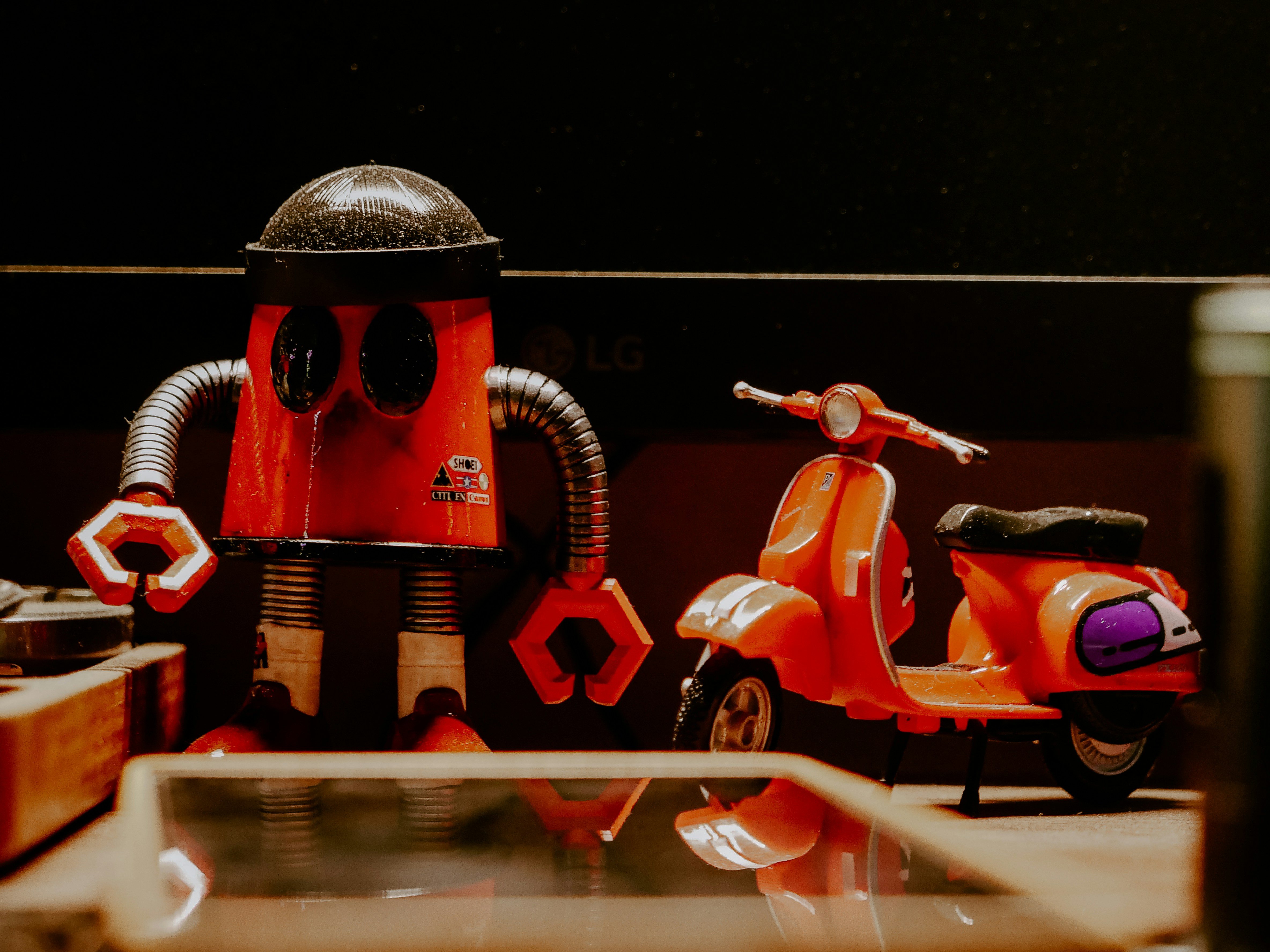 A group of toy motorcycles sitting on top of a table