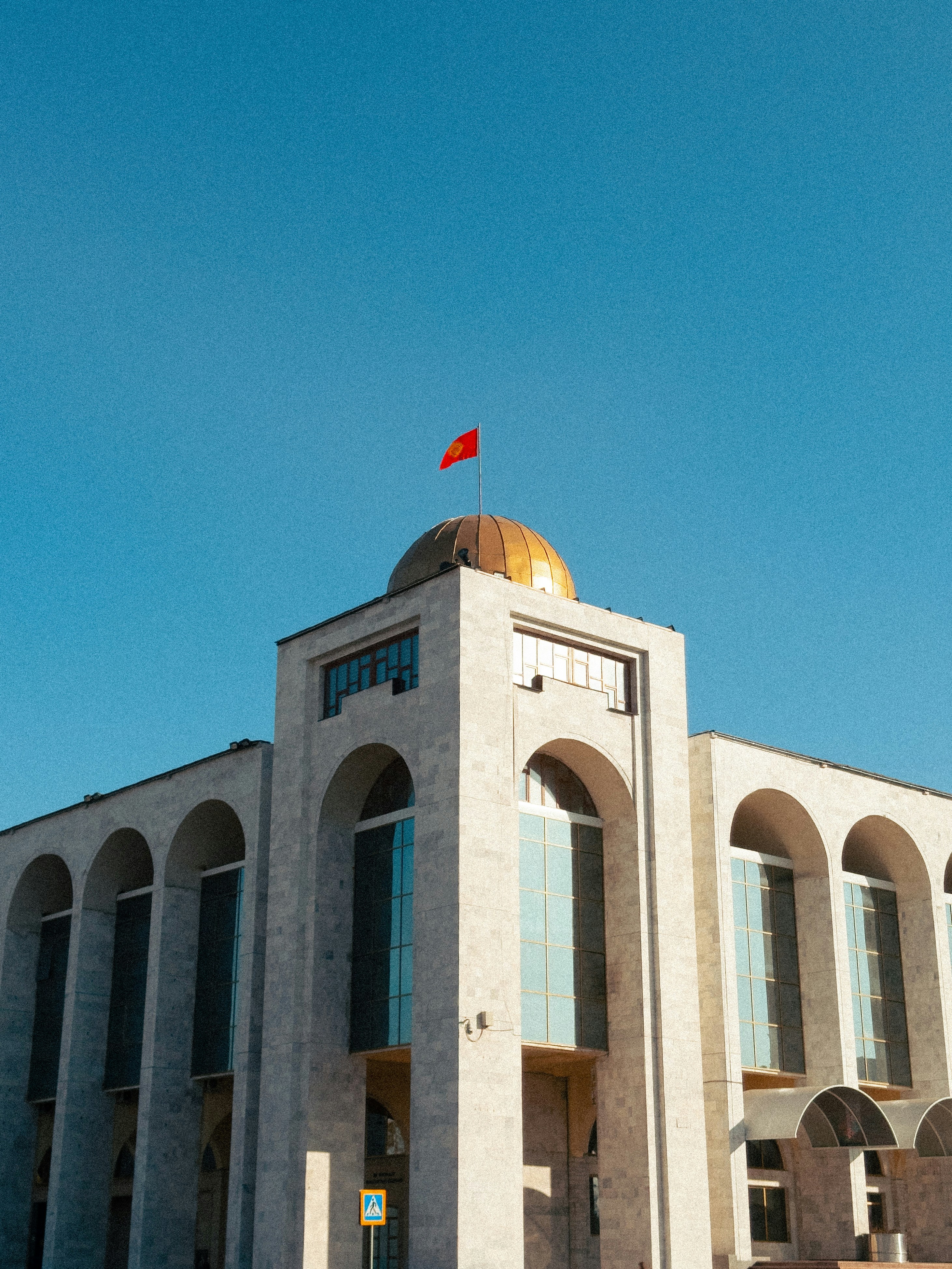 A large building with a dome on top of it