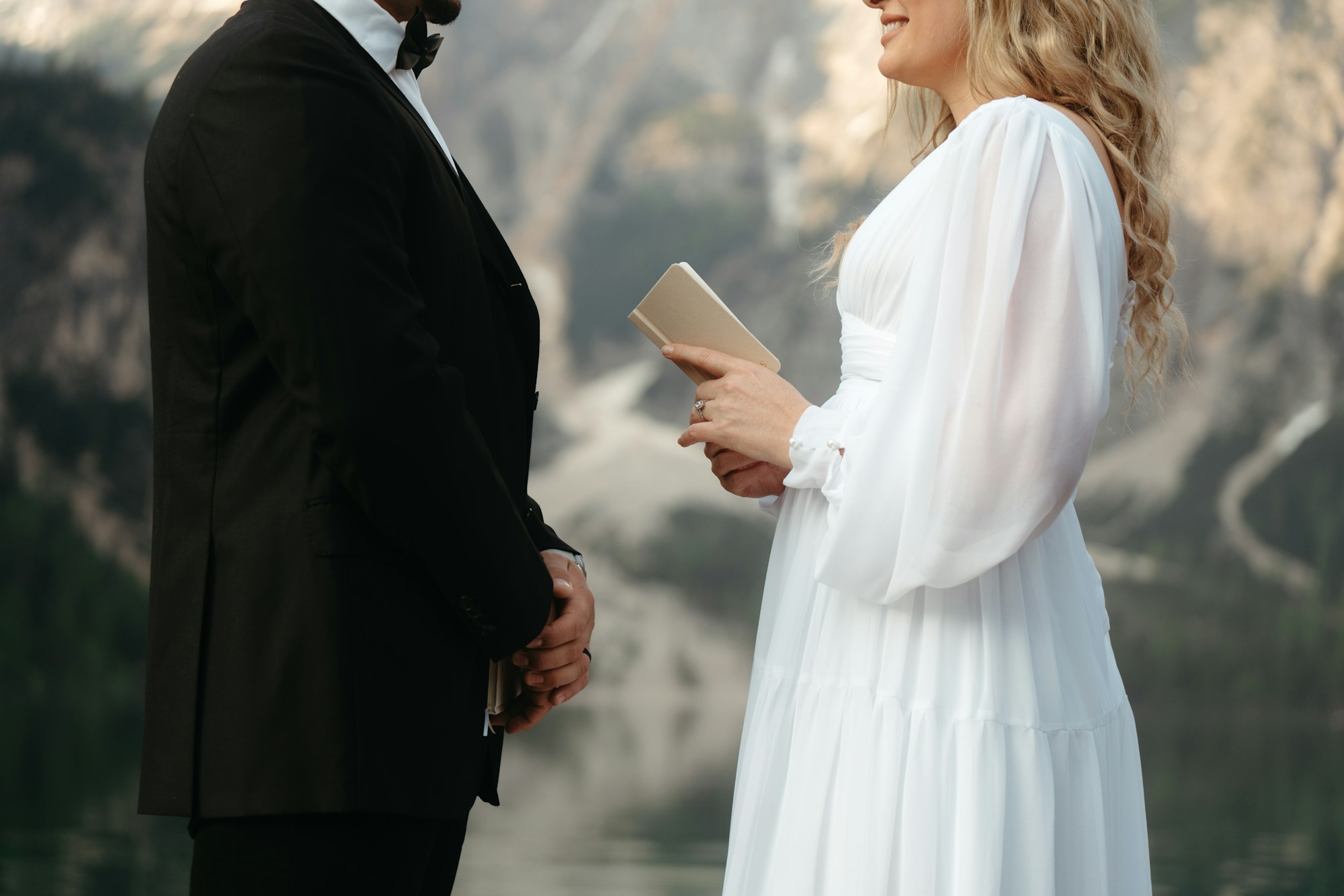 Couple exchanging vows during an intimate ceremony