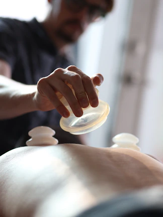 A man getting a back massage at a spa