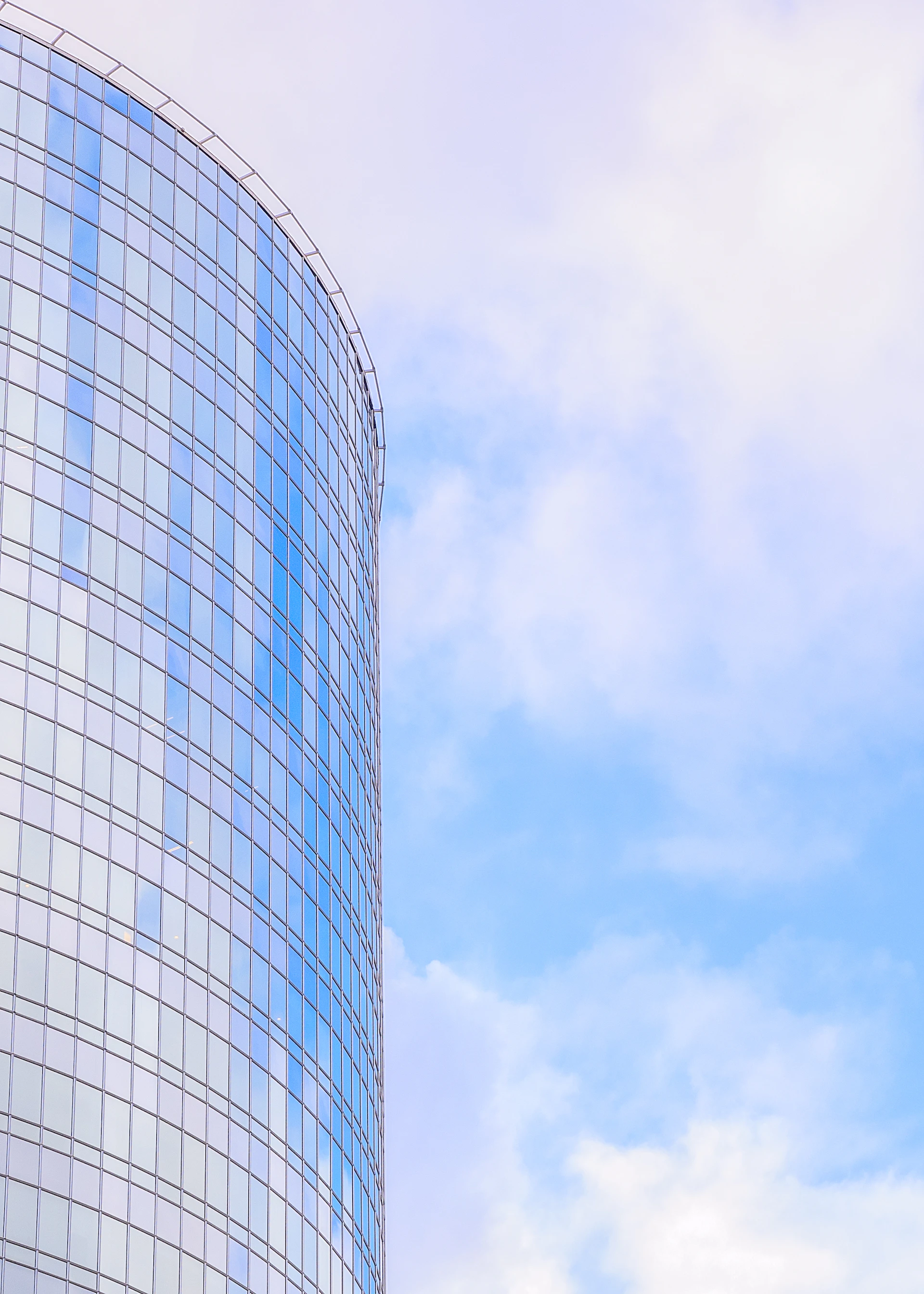 A tall building with a blue sky in the background