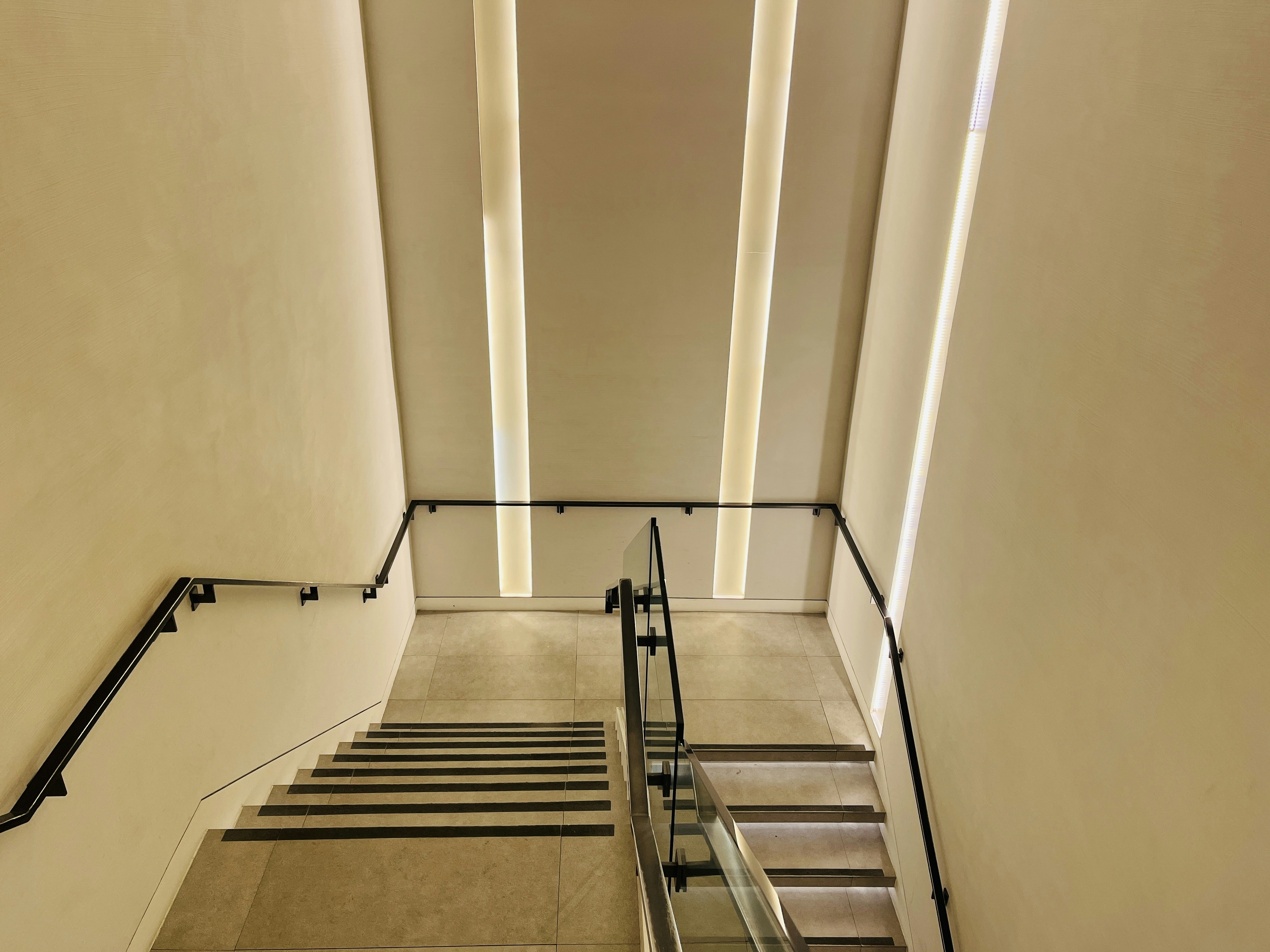 A set of stairs leading up to a second floor