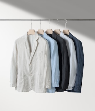 A row of shirts hanging on a clothes rack