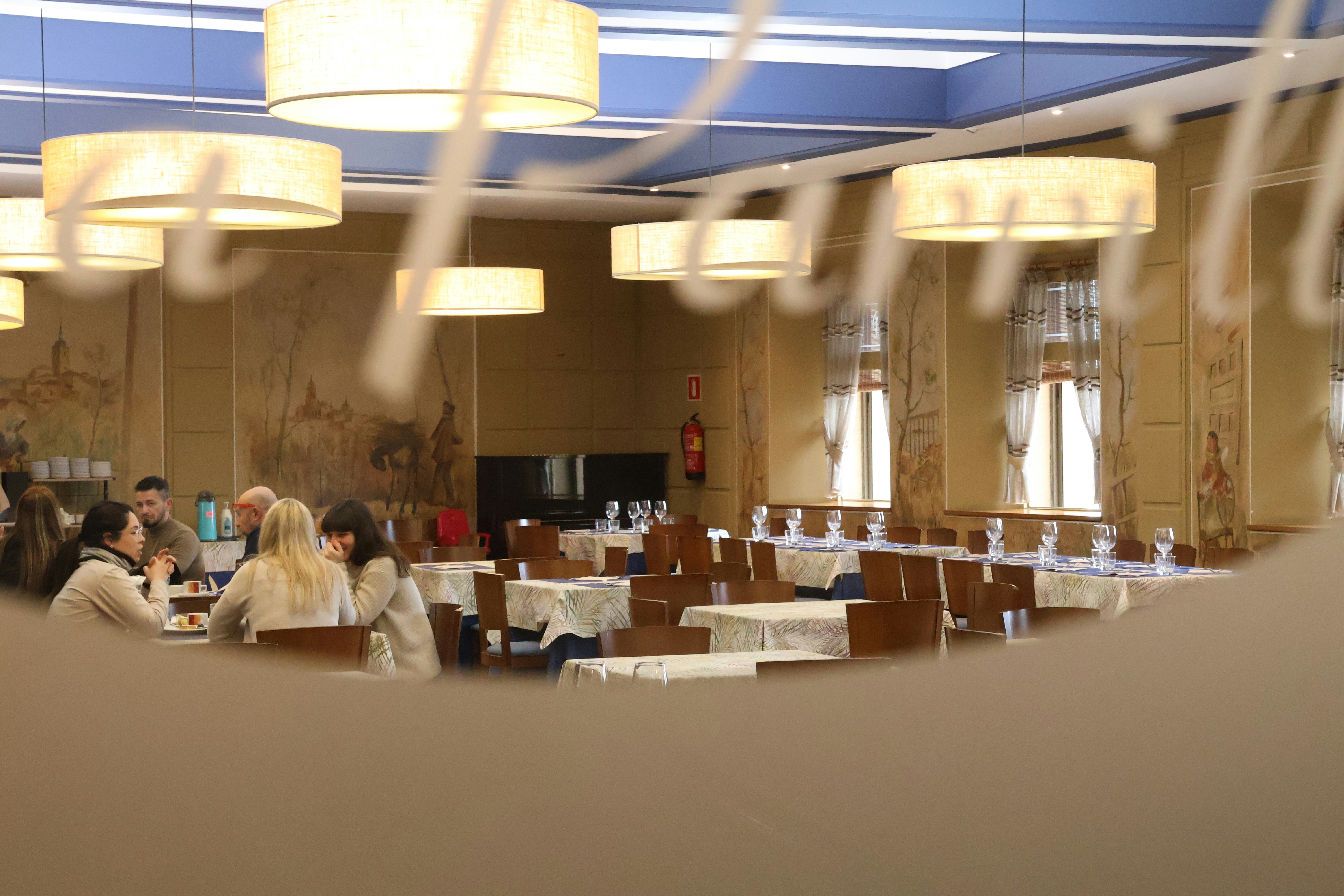 People at restaurant tables